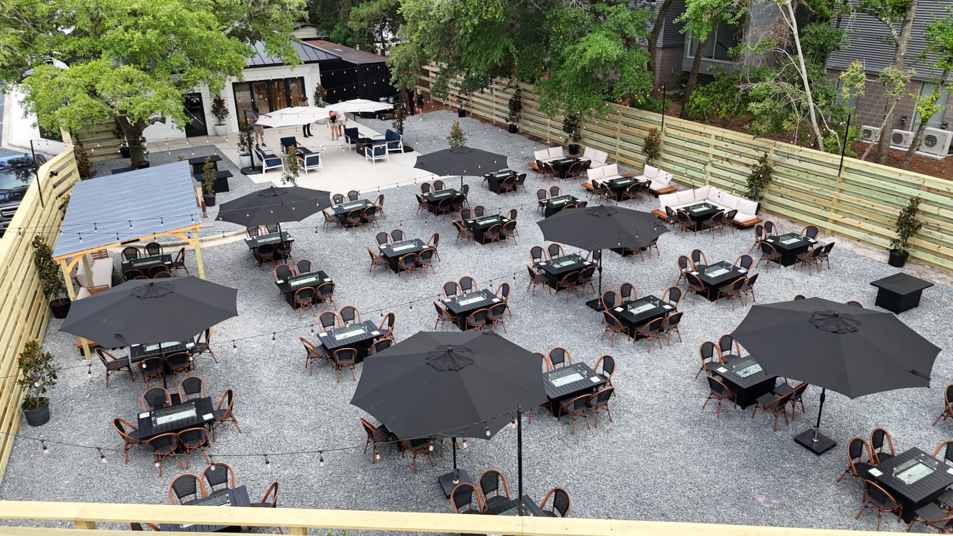 Open-air patio by day at Porter's Neck